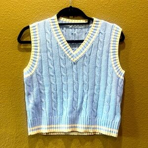 Light blue with white trim v neck sweater vest
